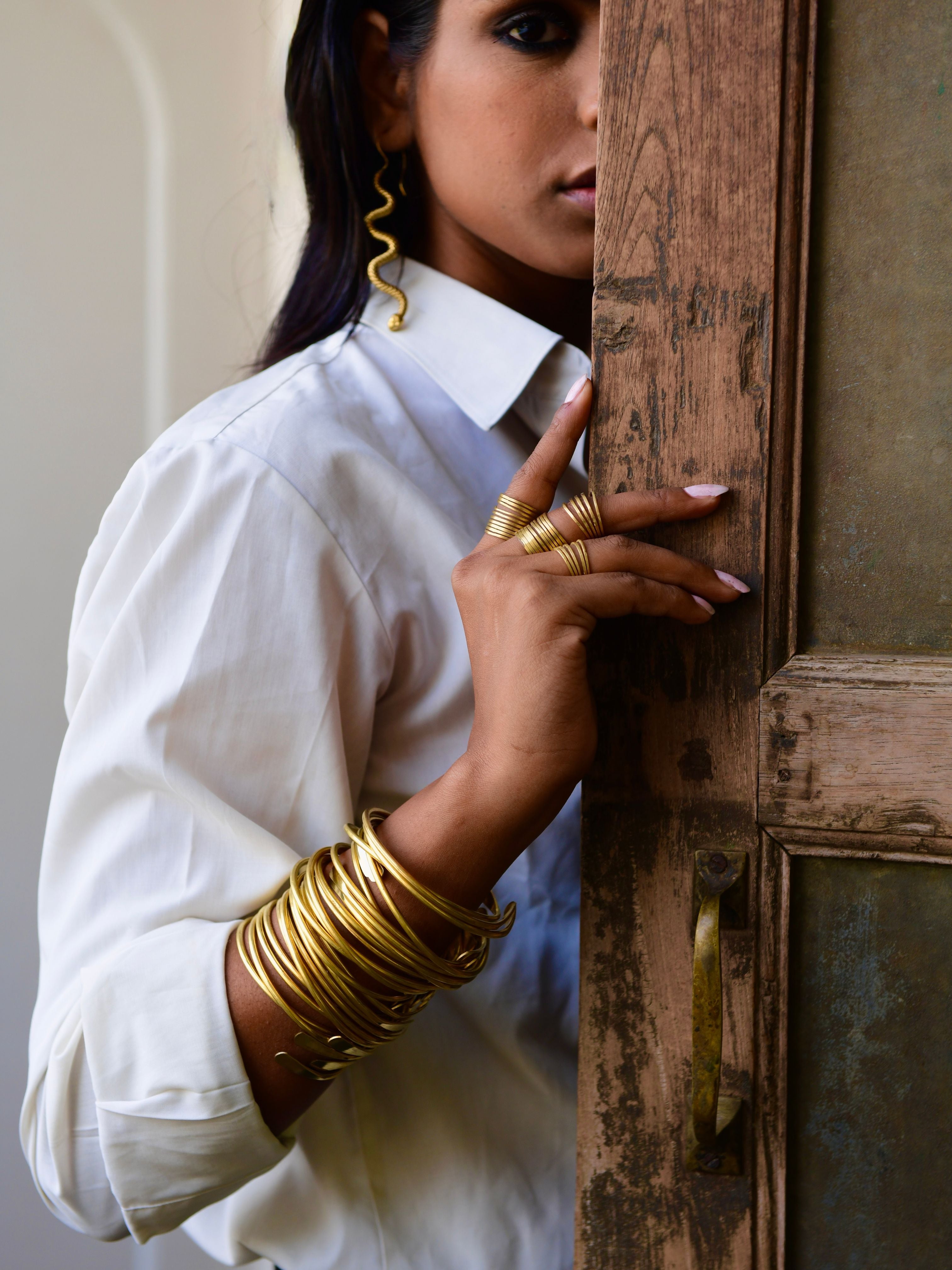 The Coil Brass Bangle (not sold in sets) by Boho Gal Jewelry
