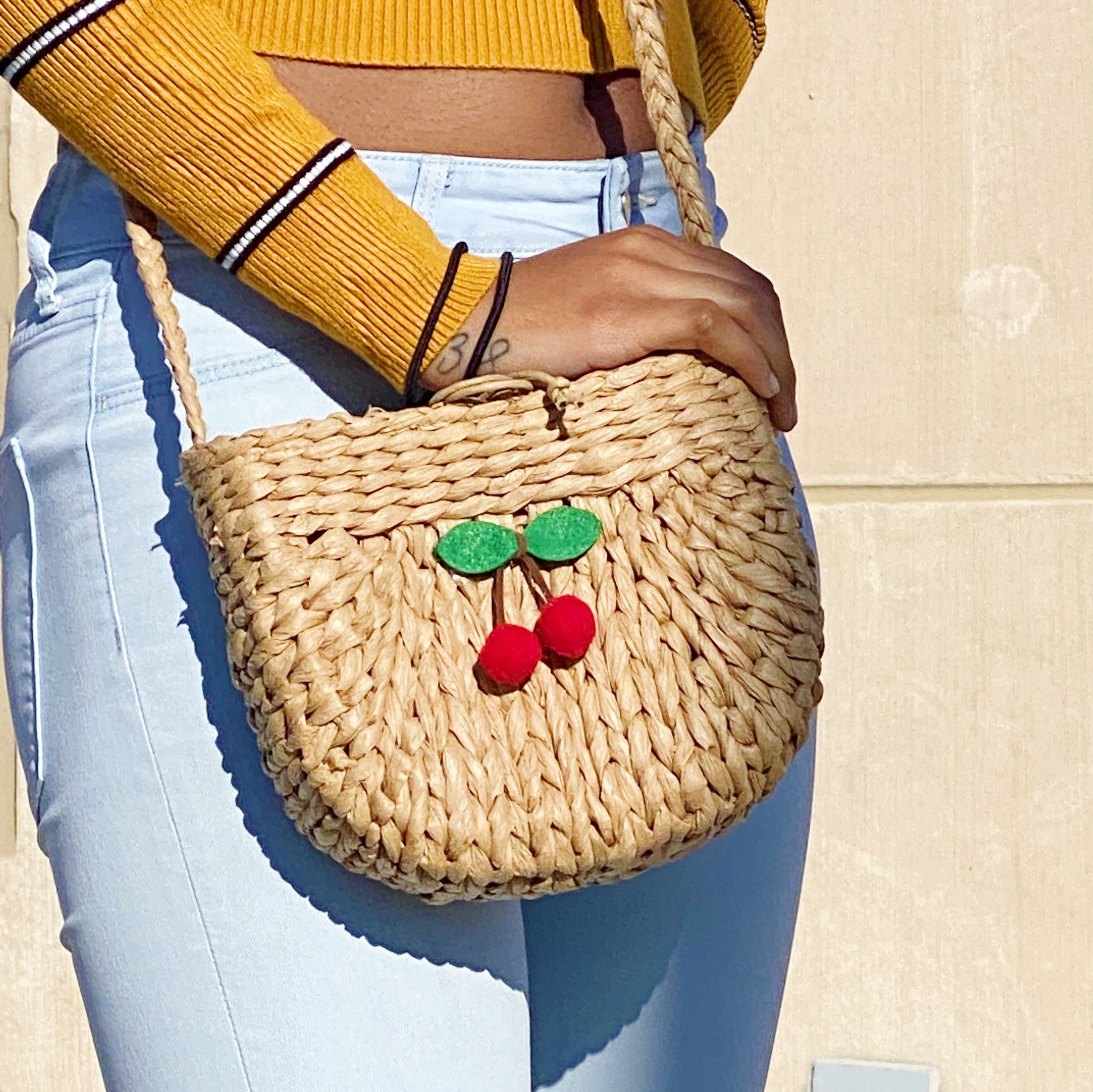 Juicy Bloom Straw Crossbody Bag by Ellisonyoung.com