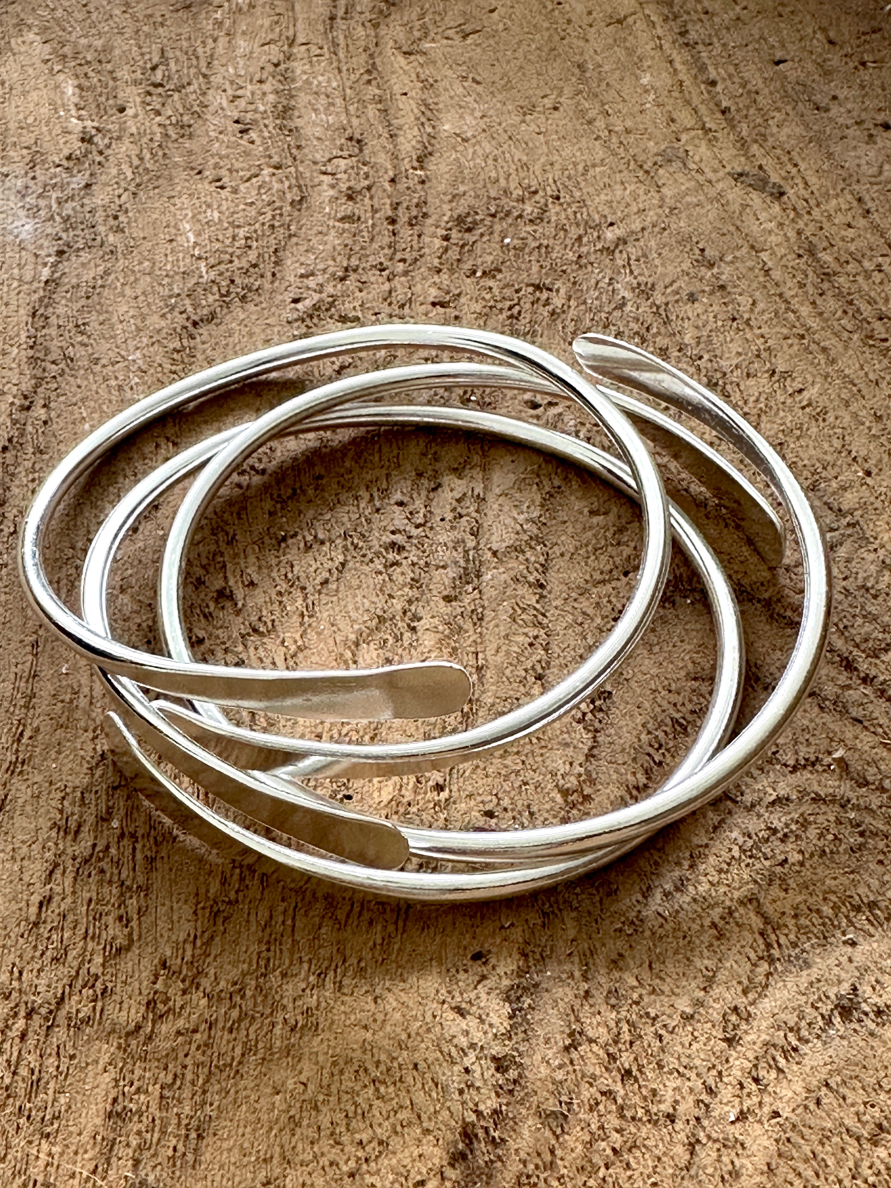The Coil Brass Bangle (not sold in sets) by Boho Gal Jewelry